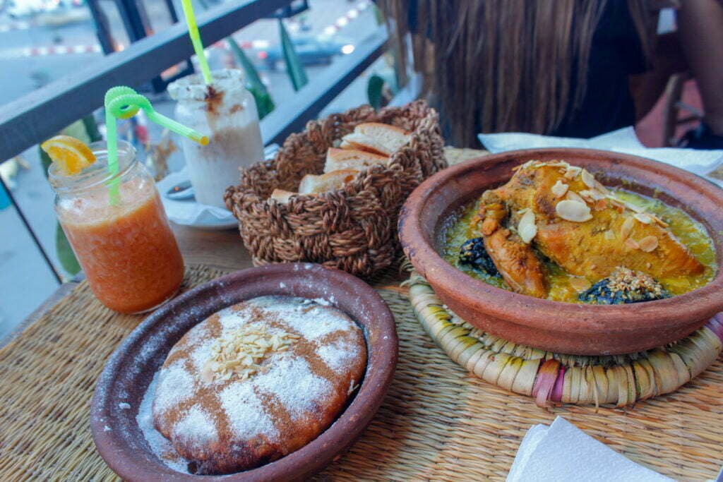 Moroccan lunch with tagine and fresh juice on a terrace