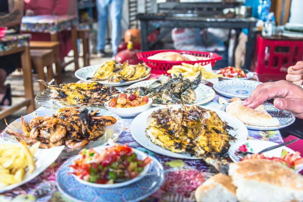 Spread of Moroccan salads and tagines on a table