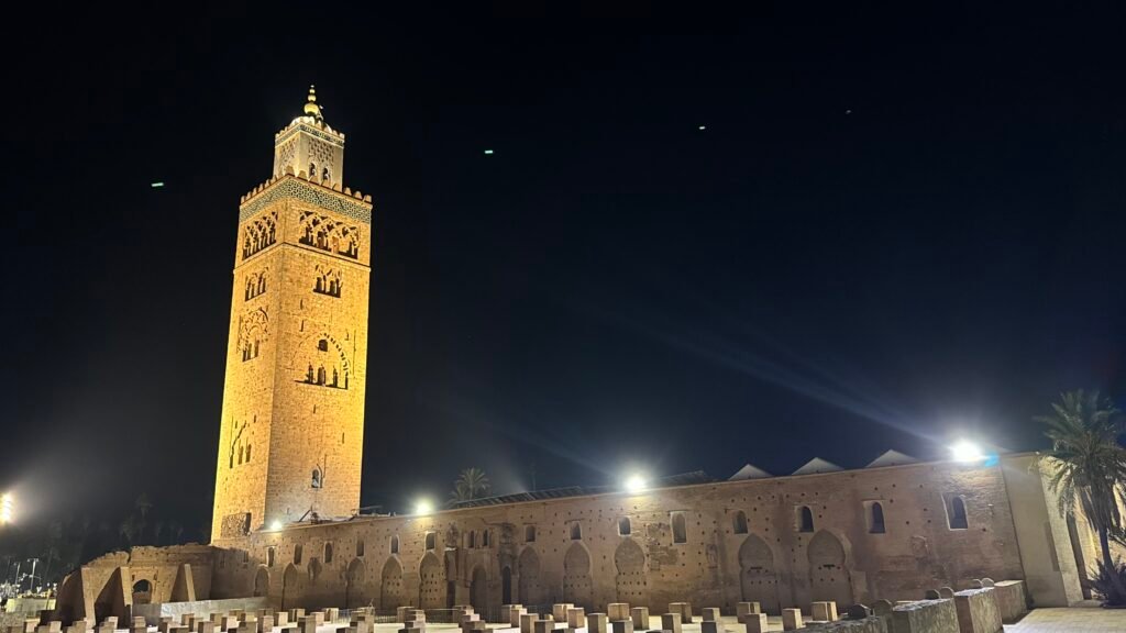Koutoubia Mosque minaret lit up at night in Marrakech