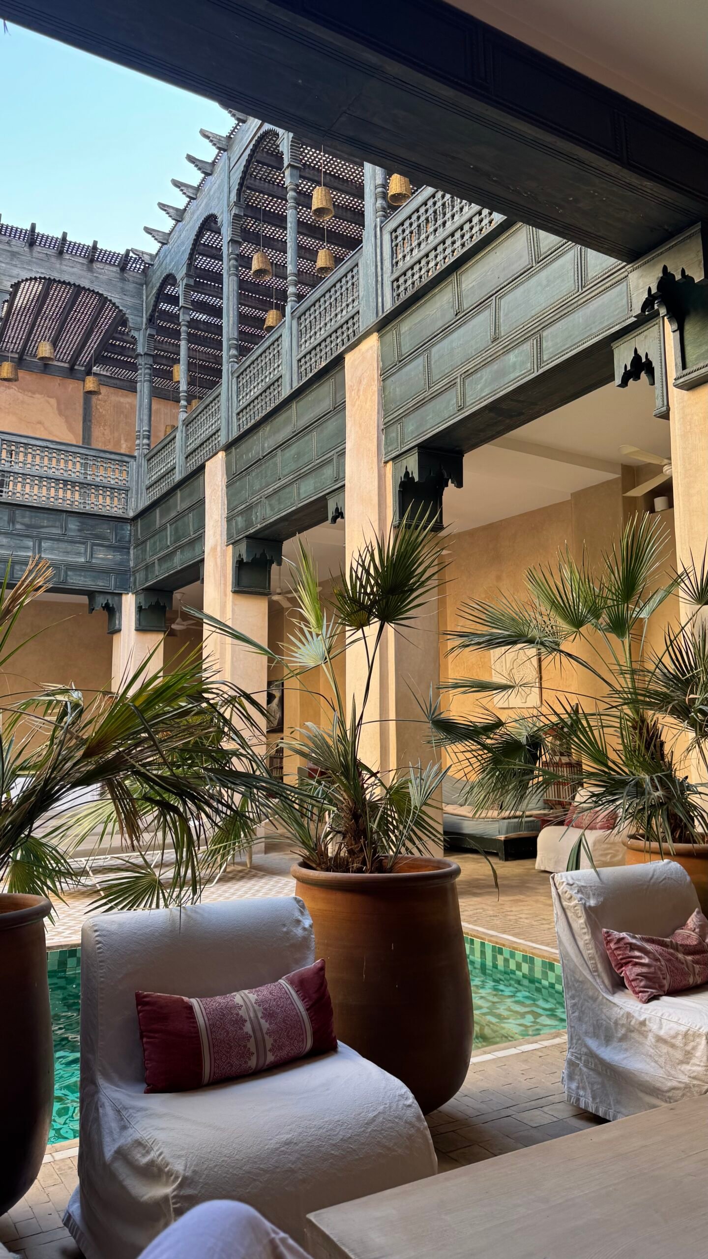 Riad courtyard with a plunge pool and traditional zellige architecture